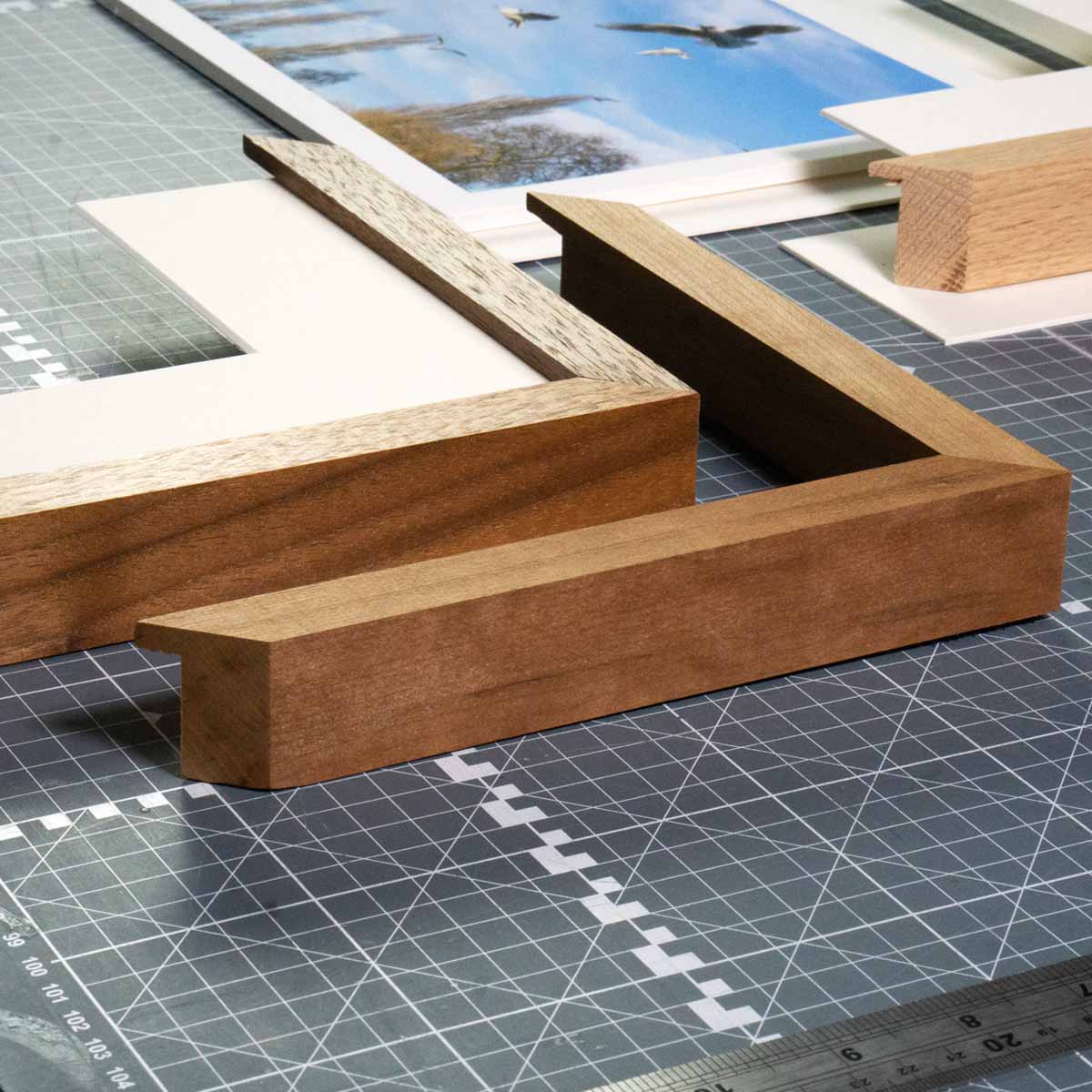 Framer assembling a picture frame in the Epic Art Story studio