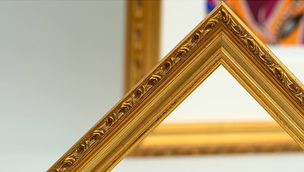 Gold ornate picture frame detail